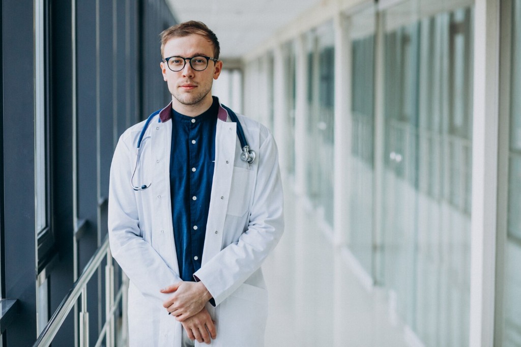 Physician in a modern hospital corridor